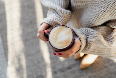 kaboompics_Hands Holding Hot Cup of Coffee